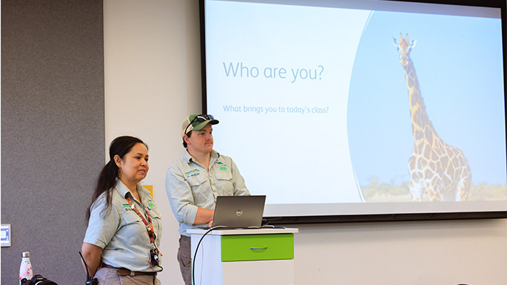 Instructors Alison and Scott at the front of the classroom